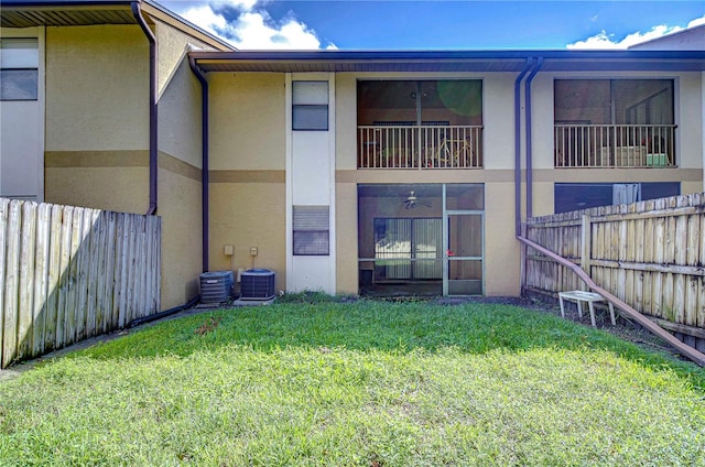 view of building exterior with cooling unit