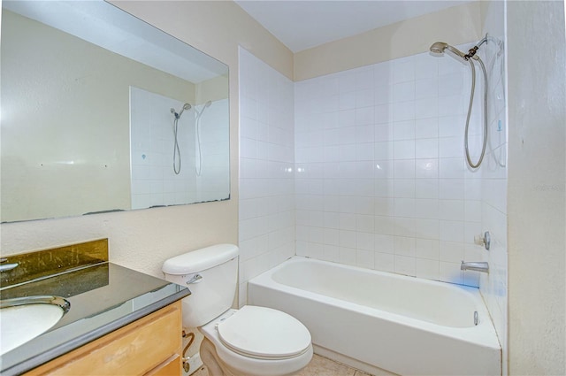 full bathroom with vanity, toilet, and tiled shower / bath combo