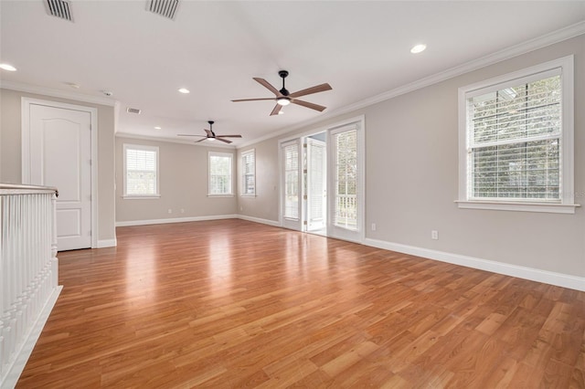 unfurnished living room with ceiling fan, crown molding, and light hardwood / wood-style flooring