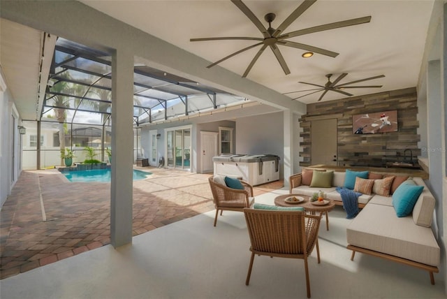 view of patio featuring an outdoor living space, glass enclosure, and a pool with hot tub