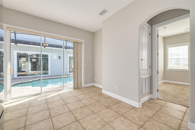 view of tiled spare room