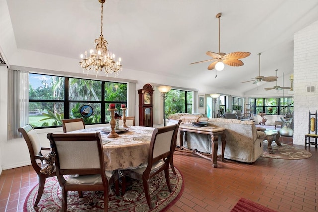 dining space featuring brick floor, plenty of natural light, high vaulted ceiling, and baseboards