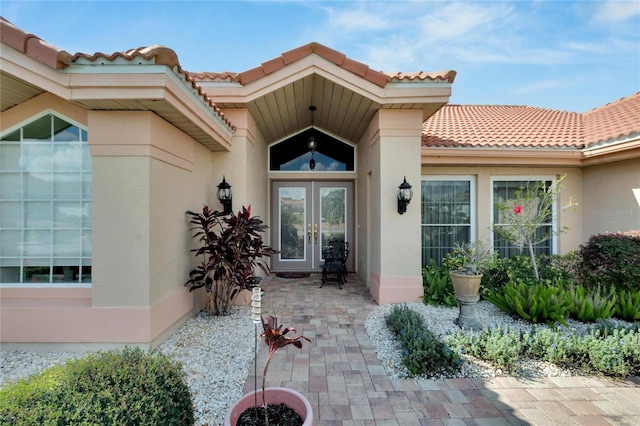 entrance to property featuring french doors