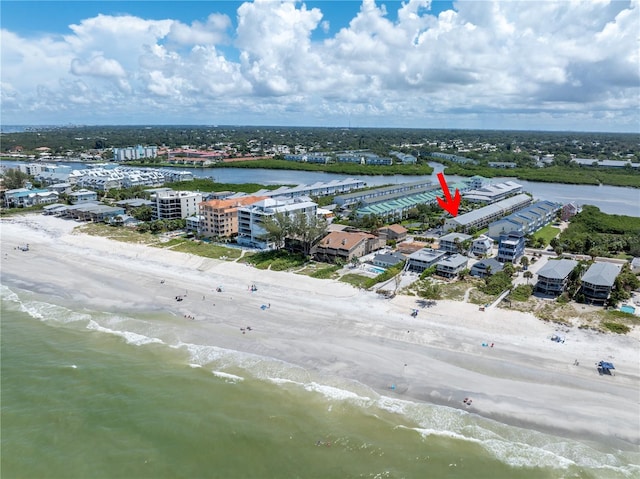 aerial view featuring a view of the beach and a water view