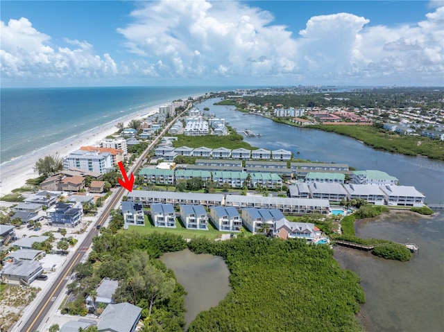 bird's eye view featuring a beach view and a water view