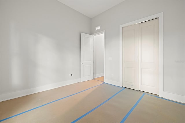 unfurnished bedroom with a closet