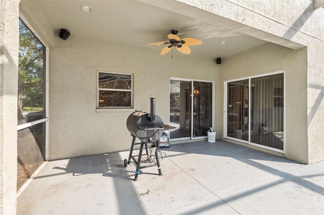 view of patio featuring grilling area and ceiling fan