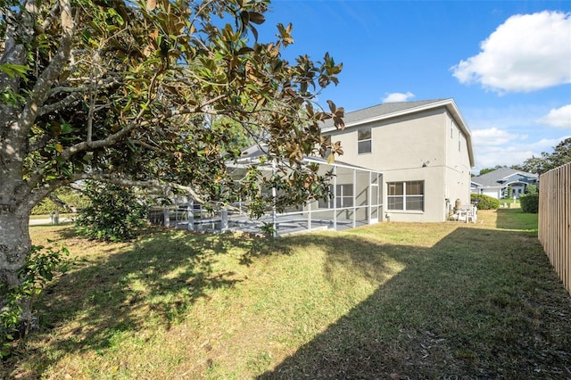 view of yard with a patio area and a lanai