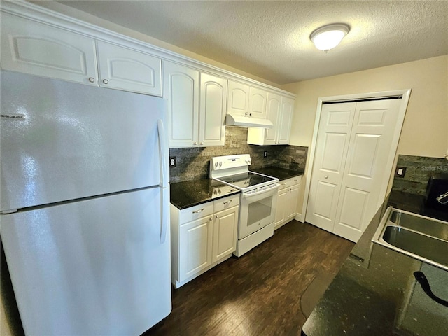 kitchen with white cabinets, stainless steel fridge, white electric stove, and dark wood-type flooring