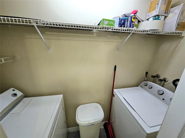 laundry room with separate washer and dryer