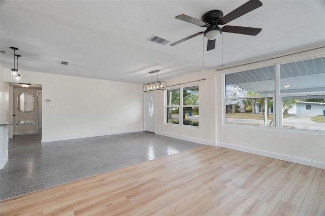 unfurnished room with ceiling fan and light hardwood / wood-style floors