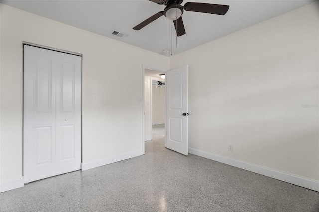 unfurnished bedroom featuring a closet and ceiling fan