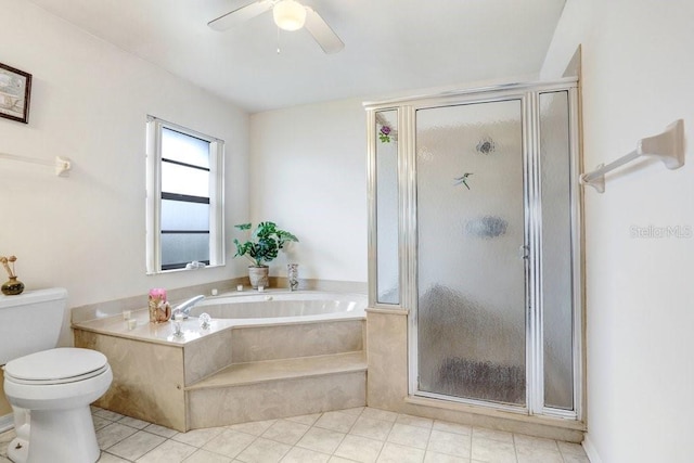 bathroom featuring tile patterned floors, toilet, ceiling fan, and independent shower and bath