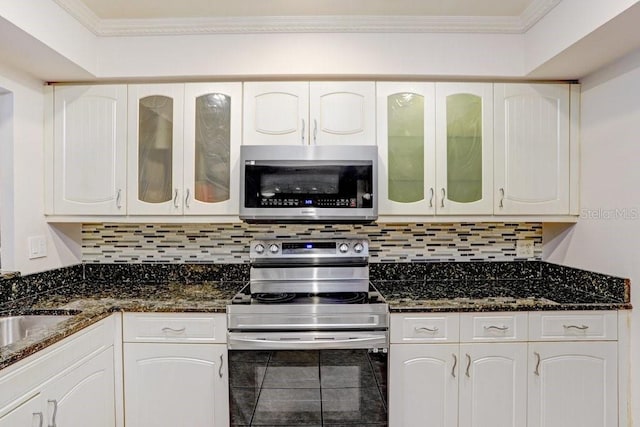 kitchen featuring white cabinets and stainless steel appliances