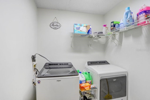 laundry room featuring independent washer and dryer