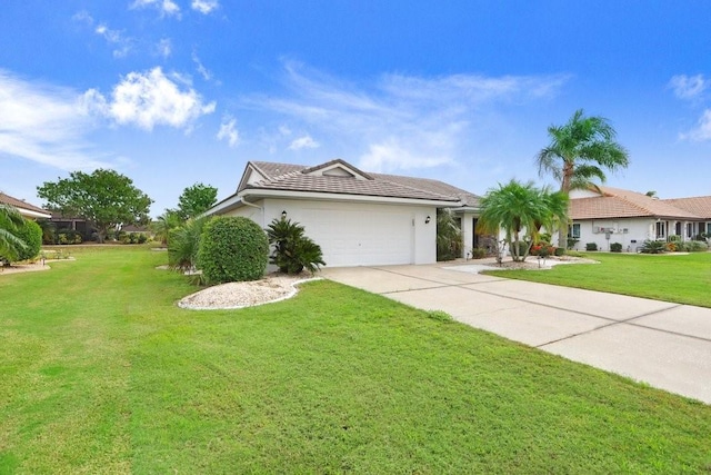 single story home with a garage and a front lawn