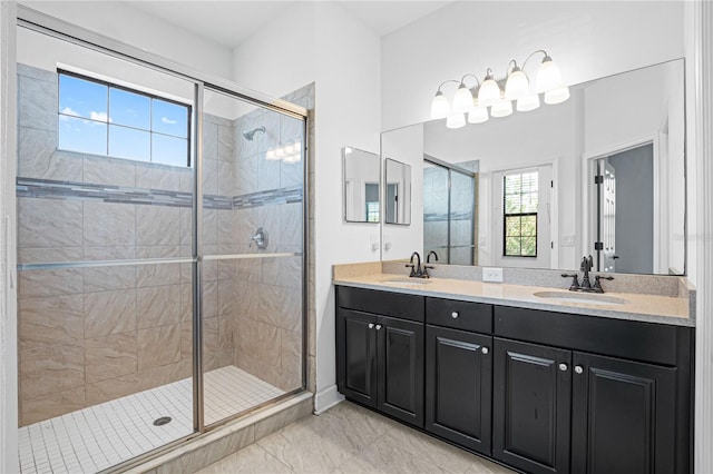 bathroom with vanity and walk in shower