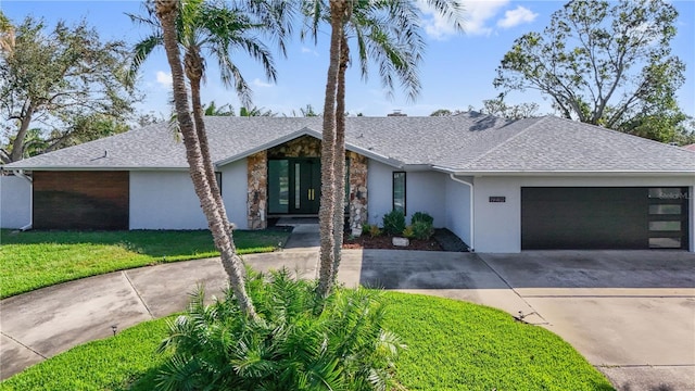 single story home with a garage