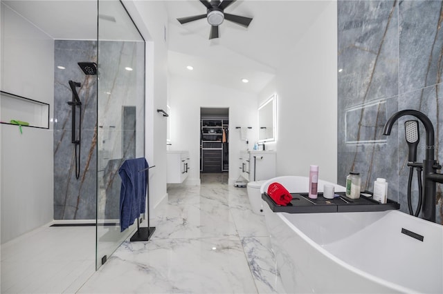 bathroom featuring vanity, separate shower and tub, vaulted ceiling, and ceiling fan