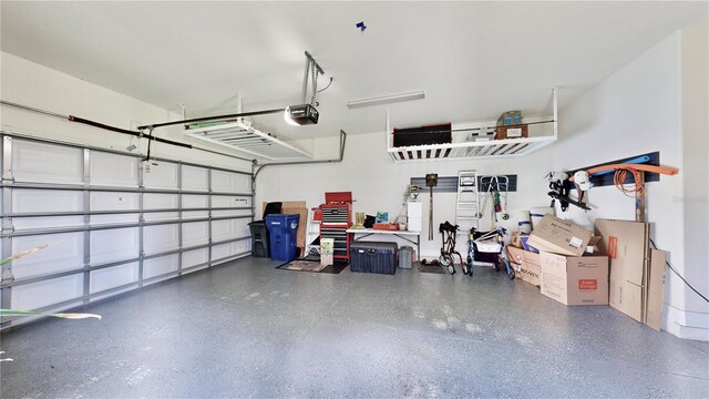 garage featuring a garage door opener