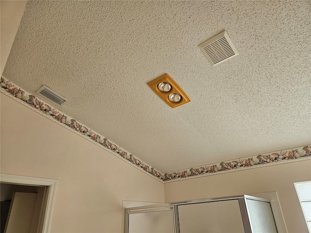 details featuring a textured ceiling