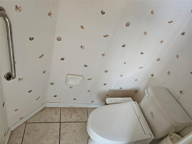 bathroom with tile patterned floors