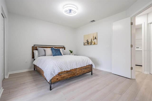 bedroom with light wood-type flooring