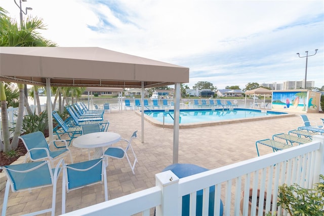 view of swimming pool featuring a patio