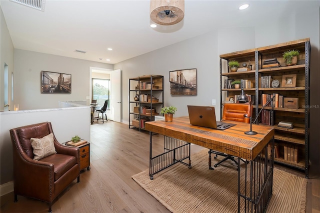 home office with light wood-type flooring