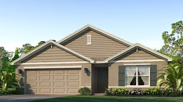 view of front of property featuring a garage and a front lawn