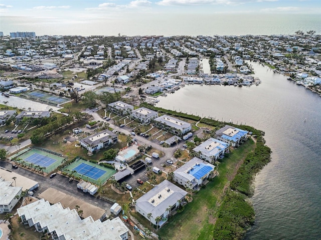 bird's eye view with a water view