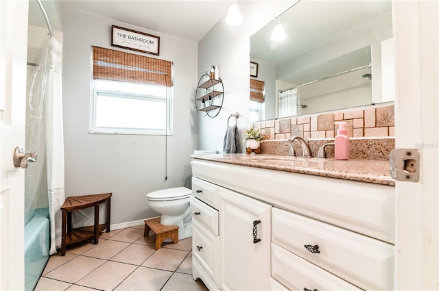 full bathroom with vanity, backsplash, tile patterned flooring, toilet, and shower / bathtub combination with curtain