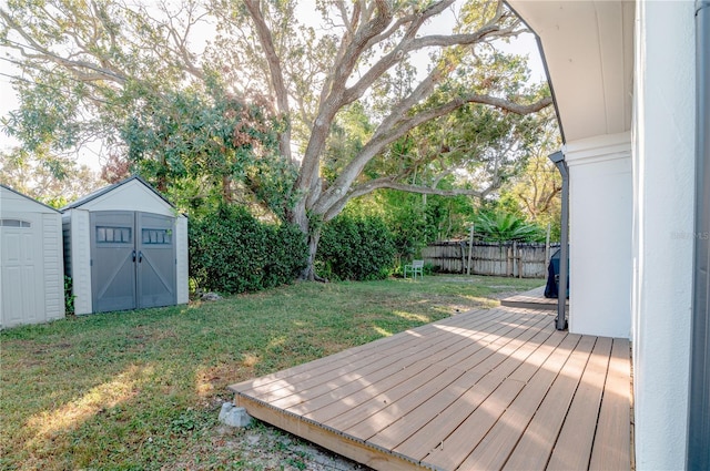 exterior space with a shed and a deck