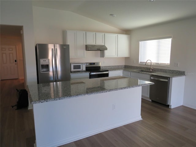 kitchen featuring lofted ceiling, dark wood-type flooring, white cabinets, sink, and stainless steel appliances