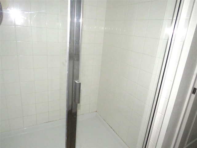 bathroom with an enclosed shower