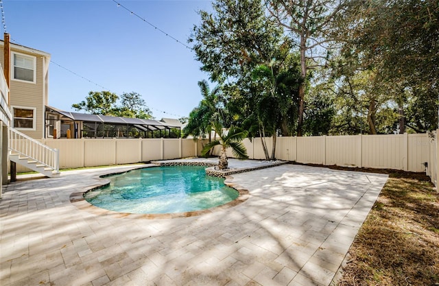 view of pool featuring a patio