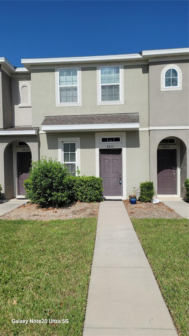 view of property with a front yard