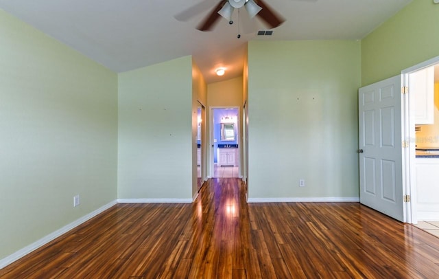 unfurnished room featuring dark hardwood / wood-style floors, ceiling fan, and high vaulted ceiling