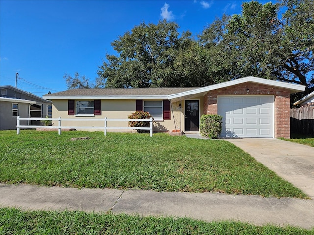 ranch-style house with a front yard and a garage