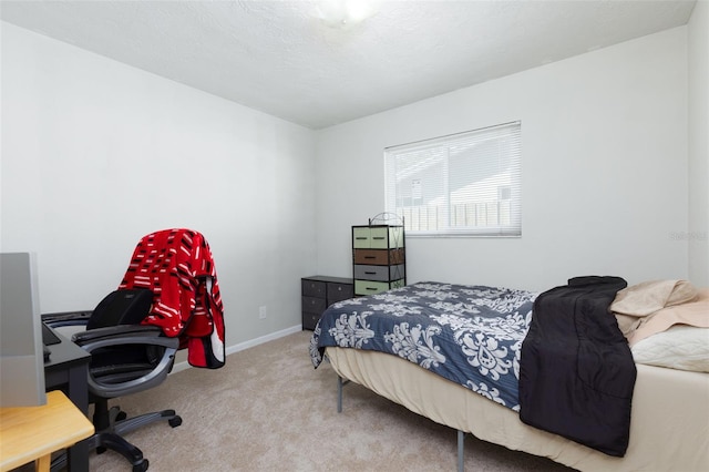 bedroom with light carpet