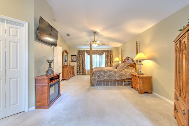 5315 Cedarshake Ln, Valrico, FL 33596 - bedroom with light carpet, baseboards, lofted ceiling, and a ceiling fan