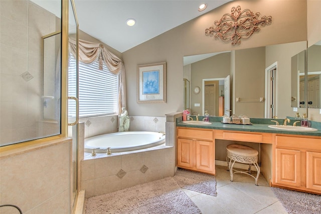 5315 Cedarshake Ln, Valrico, FL 33596 - bathroom with tile patterned flooring, a shower stall, lofted ceiling, a bath, and double vanity