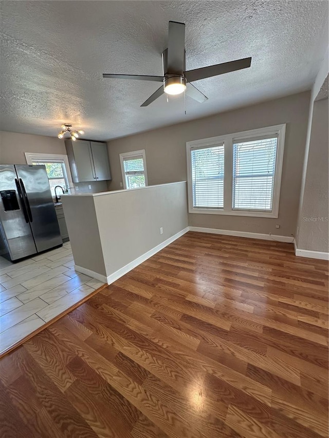 interior space featuring light hardwood / wood-style flooring and a healthy amount of sunlight