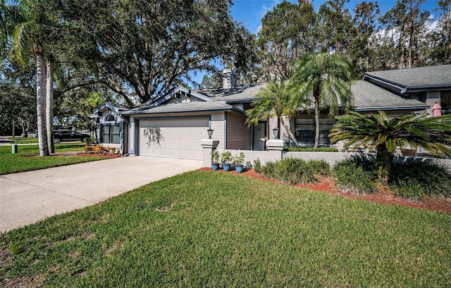 ranch-style home with a front lawn and a garage