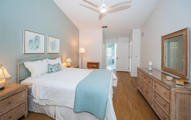 bedroom with light wood-type flooring, visible vents, and baseboards