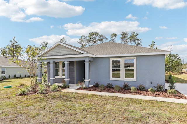 view of front facade with a front yard