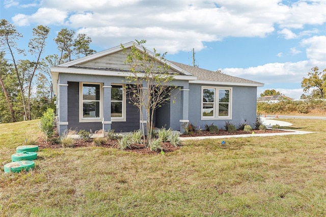 view of front of home featuring a front lawn