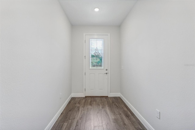 doorway featuring hardwood / wood-style floors