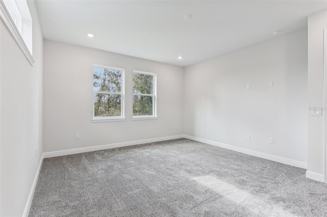 empty room featuring carpet flooring