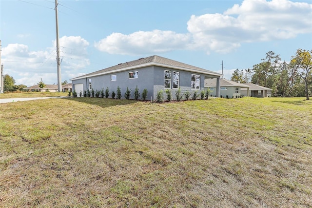 view of property exterior featuring a lawn